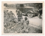 Soldiers in front of car