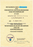 Verleihungsurkunde Medaille Winterschlacht im Osten 1941/42 für einen Gefreiten im Flakregiment 24